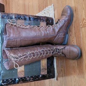 Brown lace up tall boots with buckles